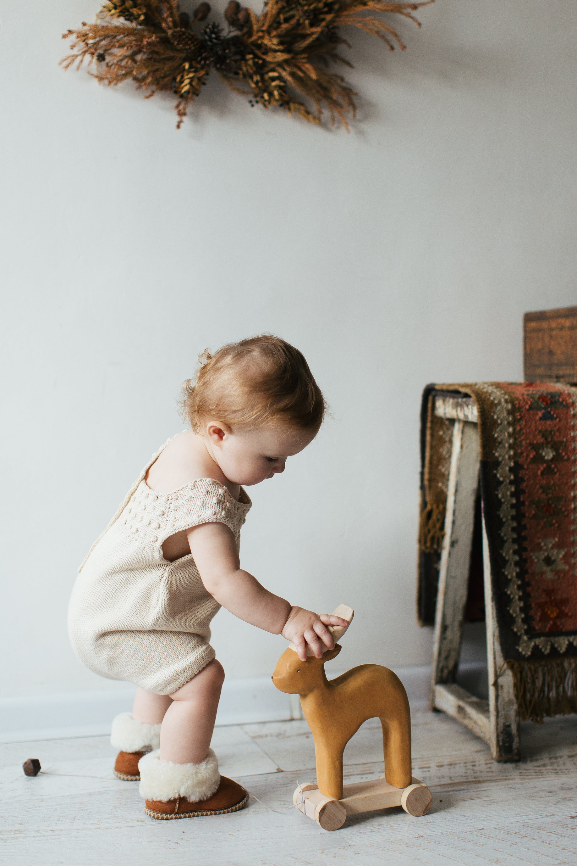 Child playing inside a room